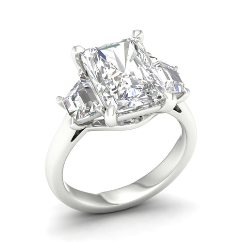5 1/4 Ctw Emerald Side Stone Three Stone Ring